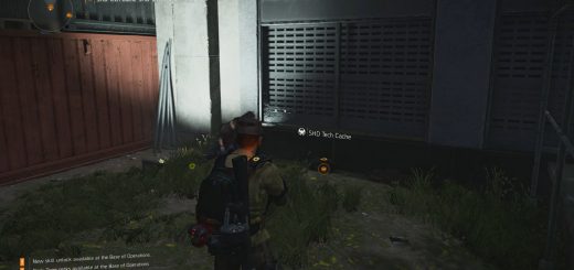 SHD in fenced area by shipping crates.