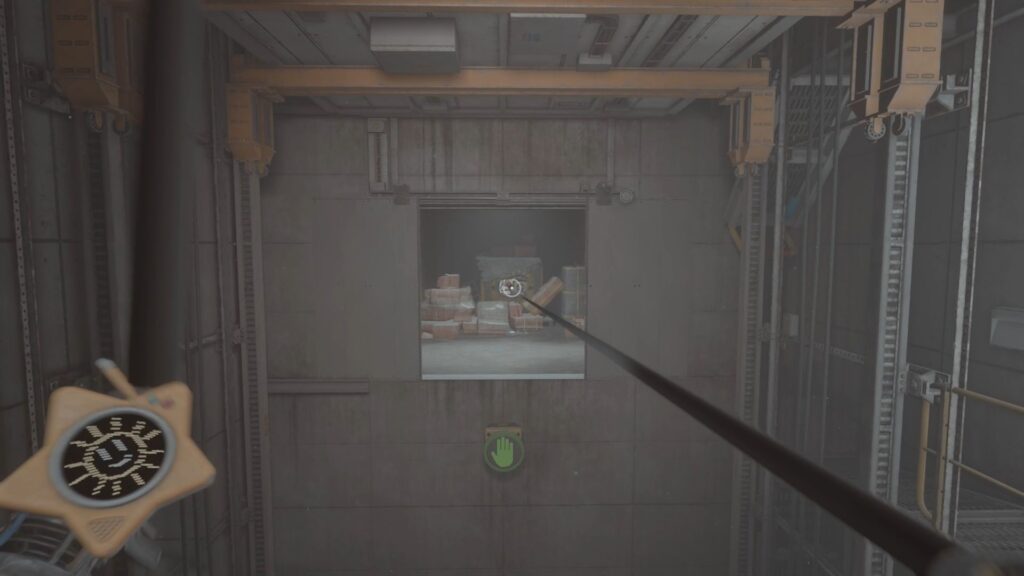 Pulling through the open elevator door.
